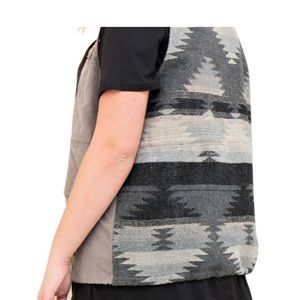 Entro Zip Up utility vest in faux suede in front Aztec Print Back size S .